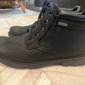 Rockport Men's Waterproof Storm Surge Toe Boot in black size 10.5 wide